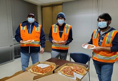 Wilmer Employees of the Month enjoy a pizza lunch to celebrate