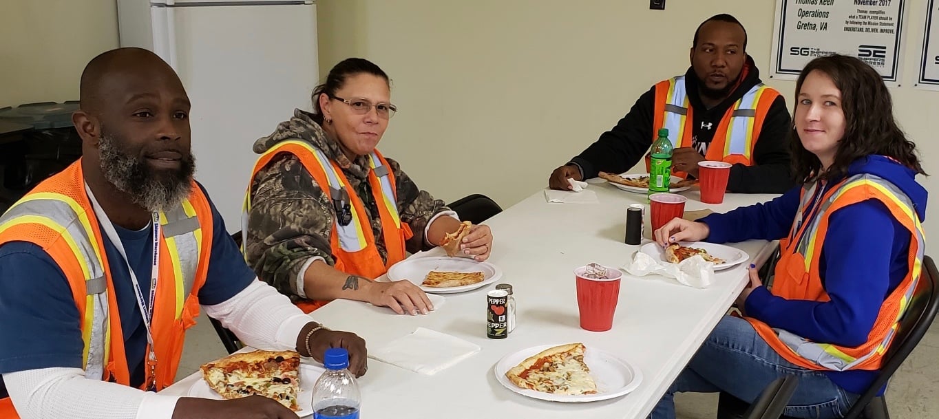 Team members from The Shippers Group Gretna location celebrate 730 days accident-free over a pizza lunch celebration