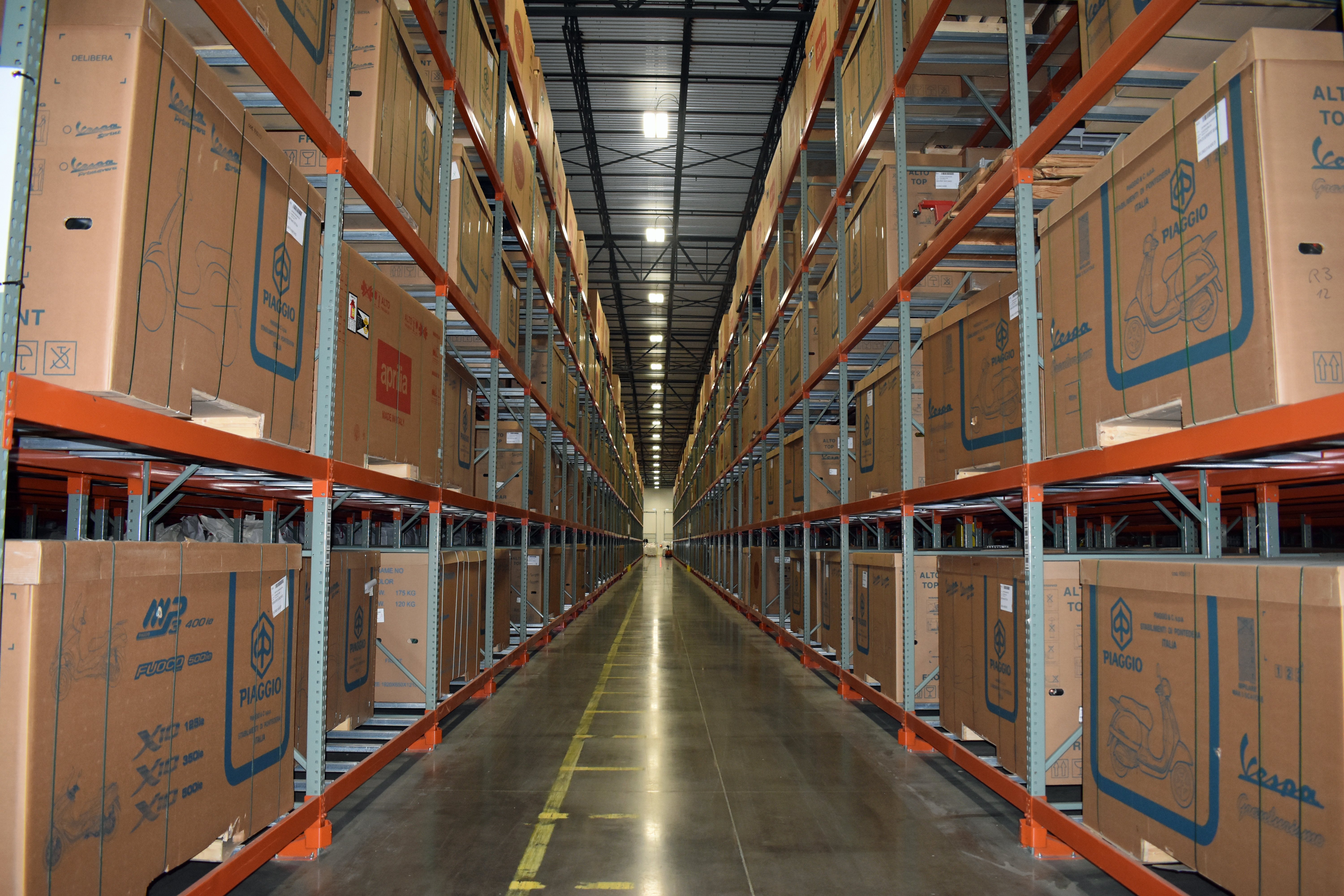 The Shippers Group Wintergreen facility stacked from floor to ceiling with uniform boxes of product neatly arranged in rows on racks